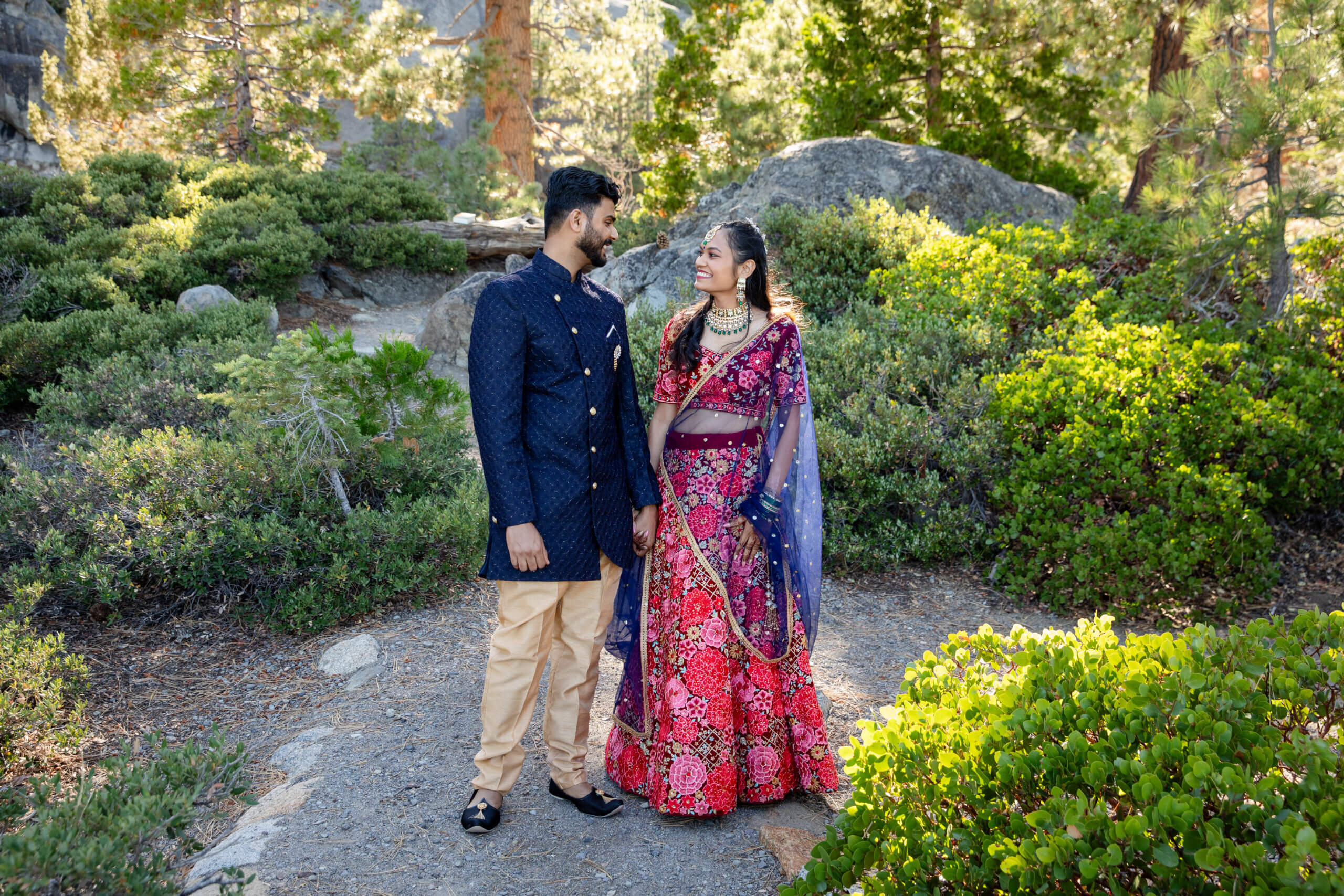 Wedding couple enjoy private forest ceremony.