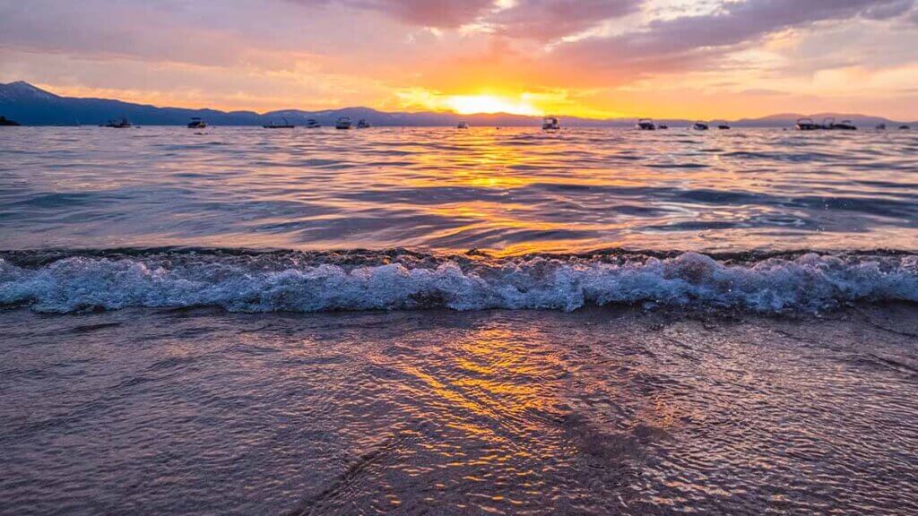 view of boats at sunset in lake tahoe