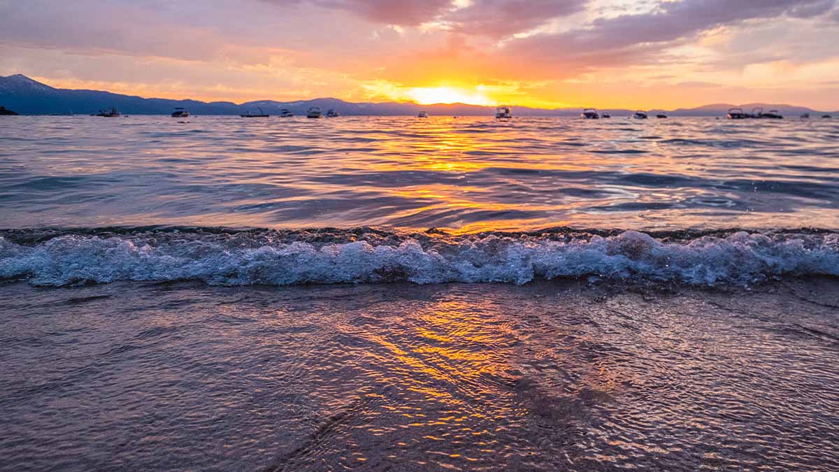 view of boats at sunset in lake tahoe